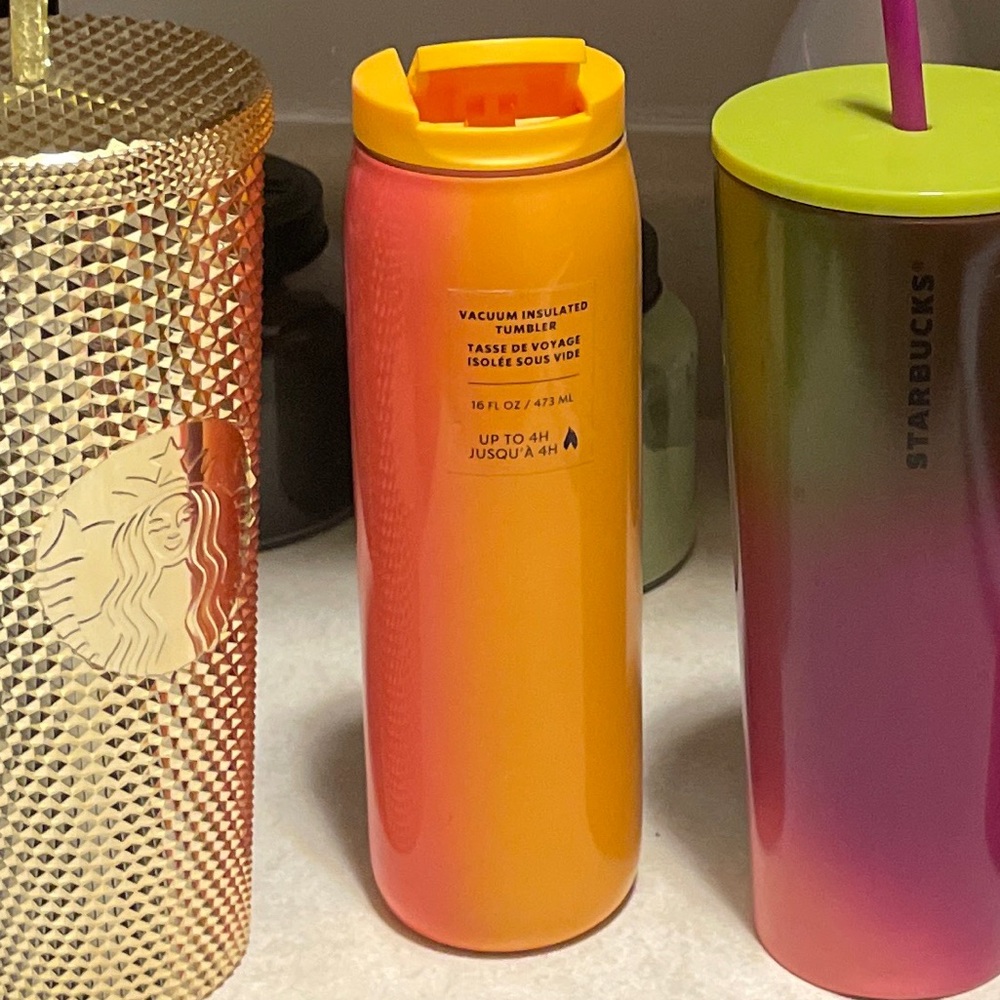 Orange/pink Starbucks hot cup